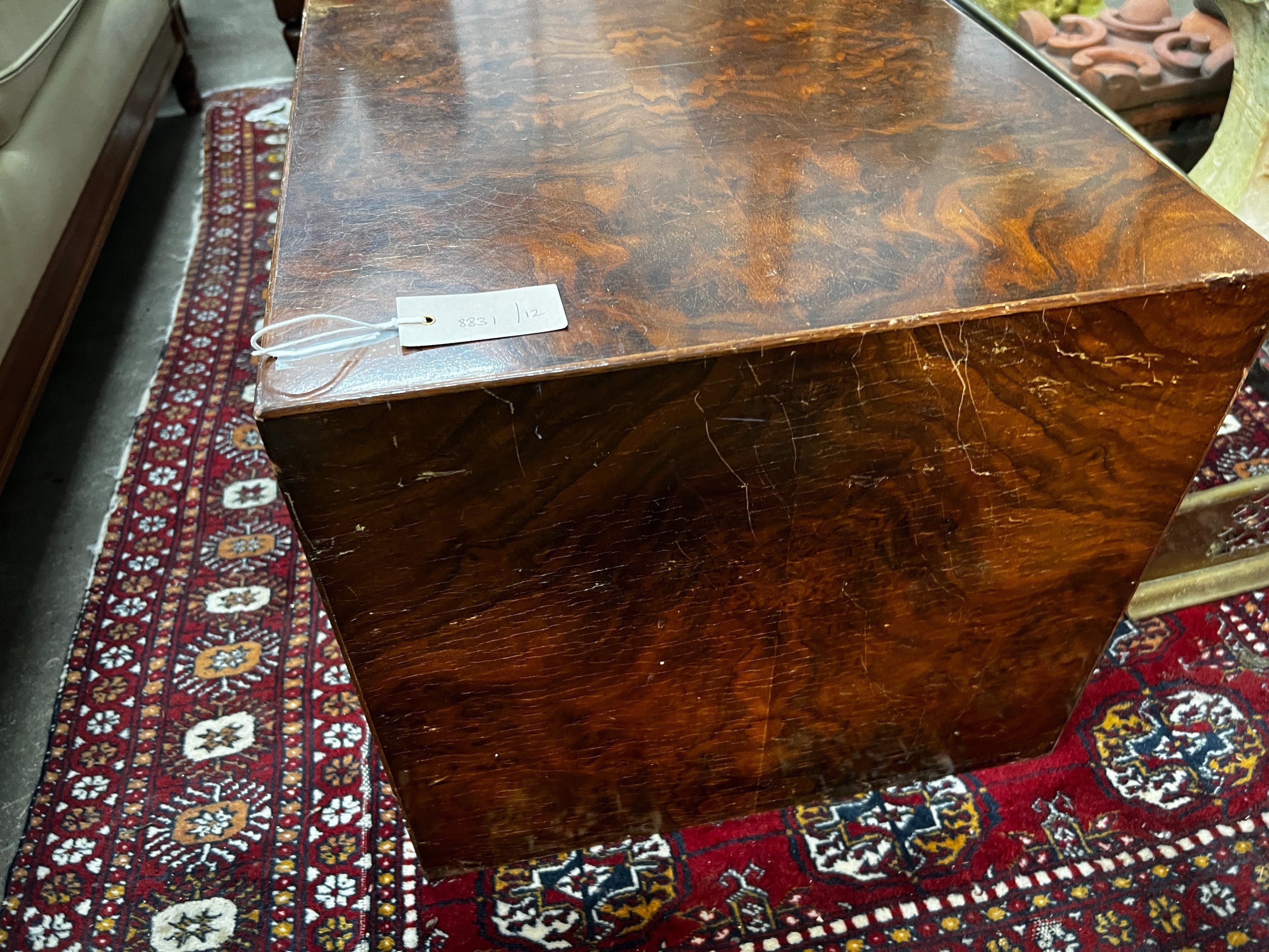 A contemporary rectangular walnut coffee table, length 122cm, depth 46cm, height 41cm